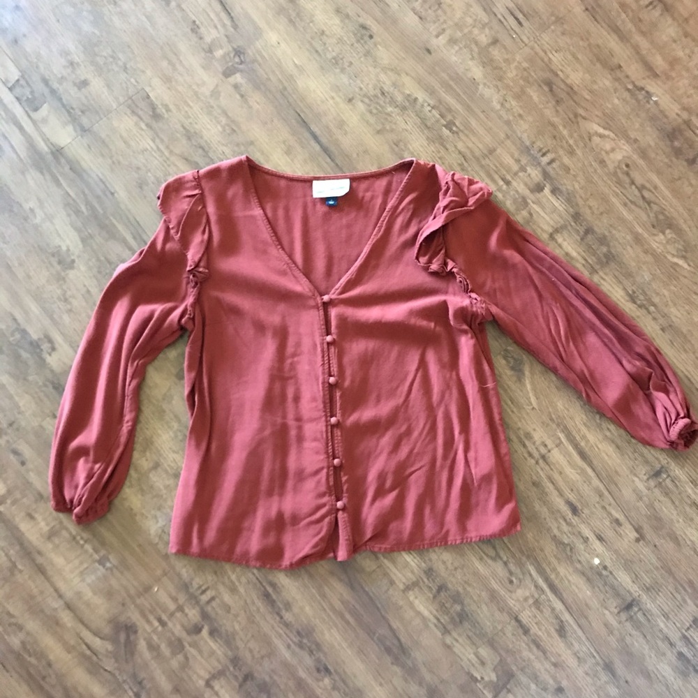 burnt orange flowy blouse